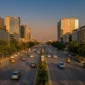 Pine Avenue Main Boulevard Lahore commercial buildings along a wide six lane road 85x85